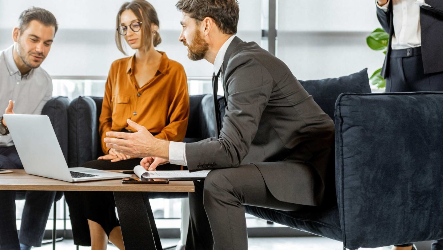 an accountant having a financial discussion with a couple